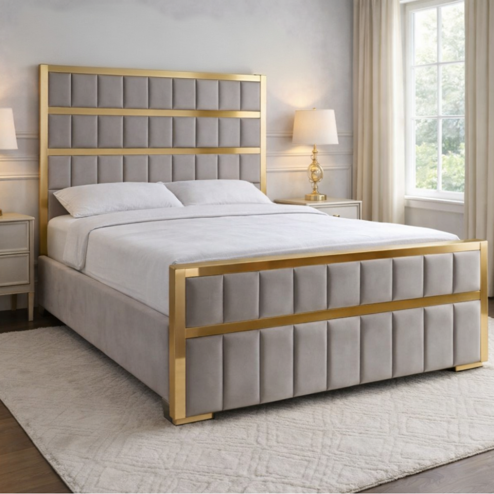 Grey upholstered panel bed with gold metal frame, tall padded headboard and matching footboard in modern bedroom setting.