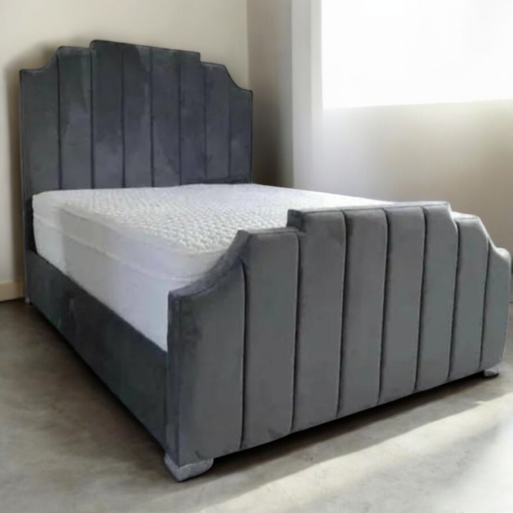Sedona Arizona Bed with grey upholstered frame, tall panel headboard and matching footboard in a modern bedroom